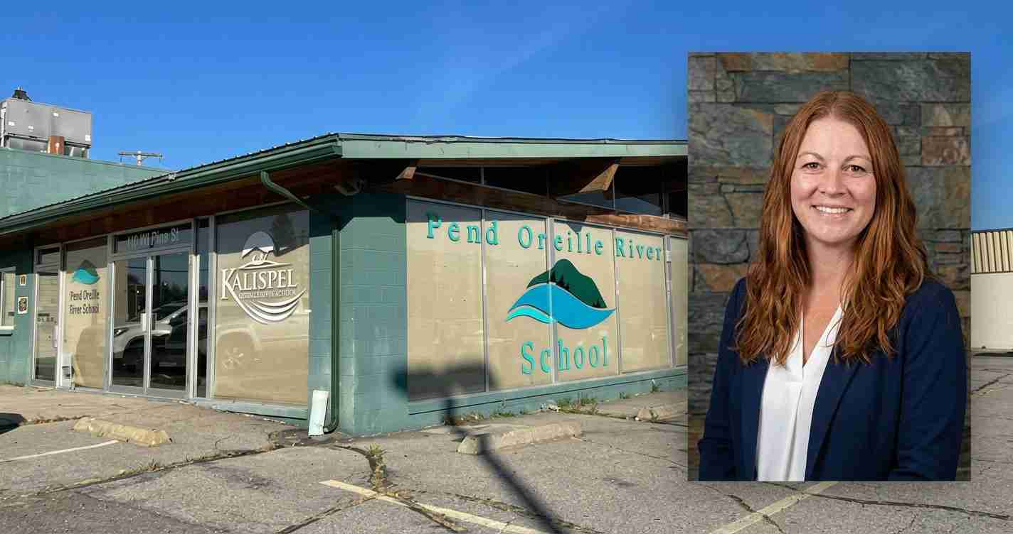 Exterior view of a low, green school building with large glass windows and a blue wave logo; a portrait of a smiling woman with long reddish-brown hair in a white blouse and navy blazer is overlaid on the right.