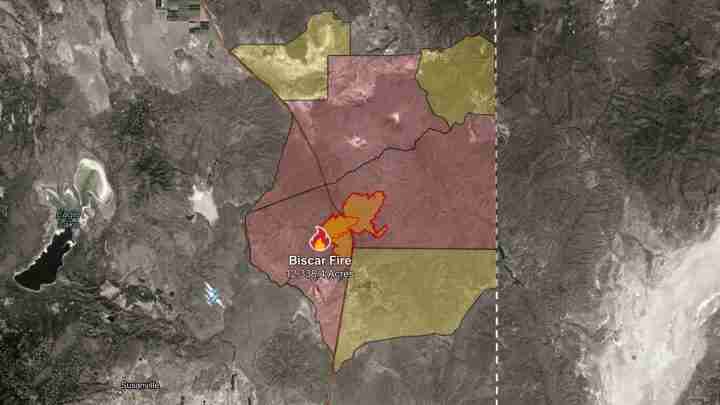 Satellite map of the Biscar Fire area with a red core and orange flames, 12,638 acres, surrounded by yellow/brown containment zones and a dashed eastern boundary line.